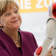 Illustration for article titled German Leader Angela Merkel Still Way Too Friendly With Robots